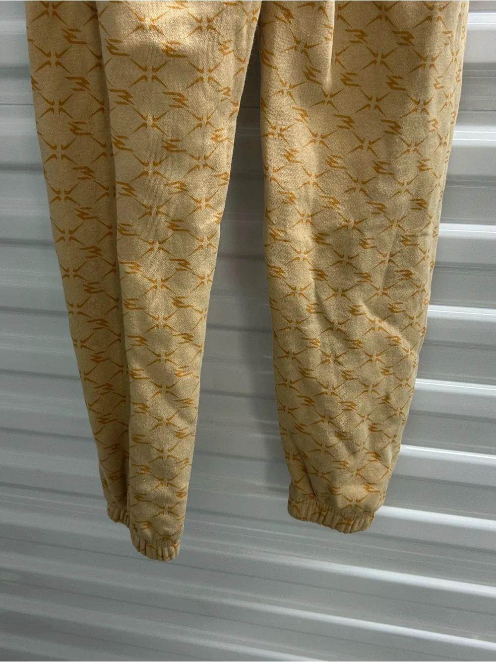 Nike Youth Light Yellow Patterned Joggers with Black Swoosh